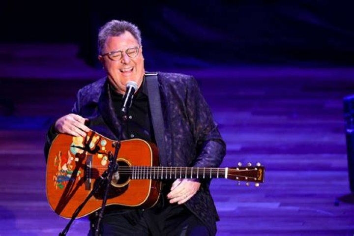 Did vince gill play with poco?